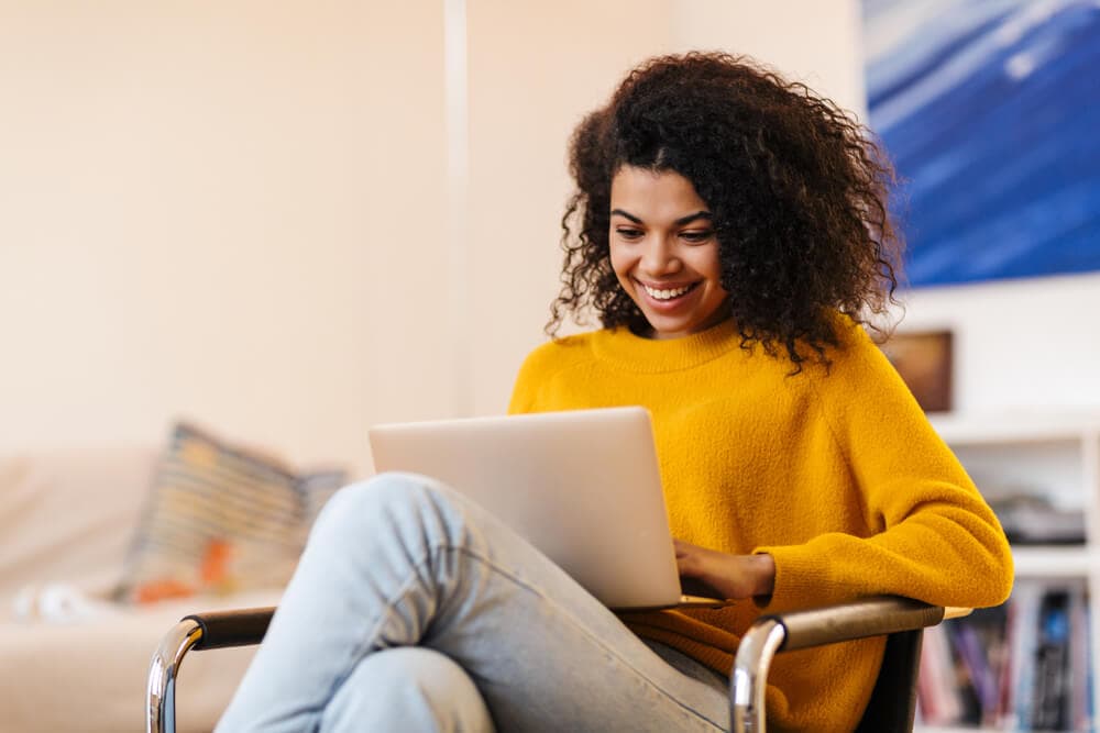 woman in laptop looking for car insurance