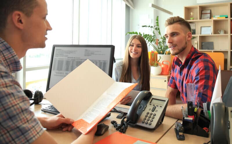 couple with insurance agent