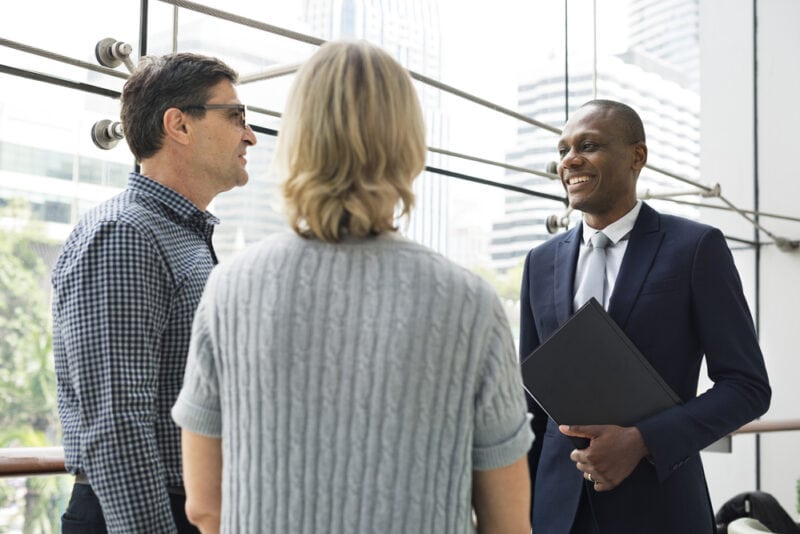 insurance agent with customers